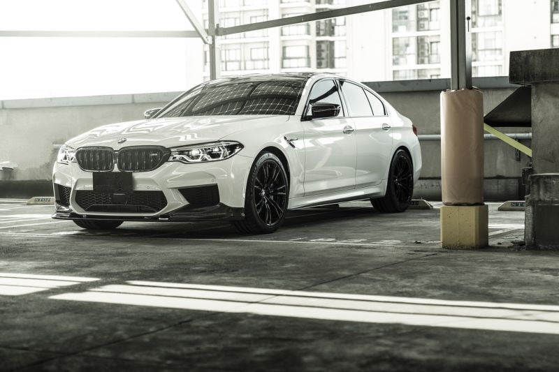 Upgrade the look of your BMW M5 with this Full BMW M Performance style kit. Made from high-quality carbon fibre, this kit includes a front lip spoiler, bumper splitters, fender trims, side skirts, mirror covers, rear spoiler, and rear diffuser. Order now and turn heads on the road.