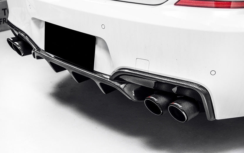 BMW 6 Series F06/F12/F13 M Sport or BMW M6 M Performance Inspired Carbon Fibre Rear Diffuser for Quad Tip Set up - This product is handcrafted to order and professionally test fitted before shipping to ensure the correct fitment is achieved. Manufactured from 2*2 3K Twill Carbon Fibre weave with FRP base giving the product a strong and durable finish. Enhance your 6 Series or M6 for those looking to either enhance their already stunning 6 Series or M6 or add a Quad Tip Exhaust System. 