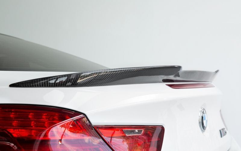 BMW 6 Series and M6 Vorsteiner Inspired V Style Carbon Fibre Rear Spoiler - Manufactured from Real Carbon Fibre inspired from Vorsteiners own spoiler for the 6 series model with the indentation in the centre creating a more unique look than the M Performance rear spoiler. Giving increased downforce to the rear of your 6 Series model for more grip when cornering.