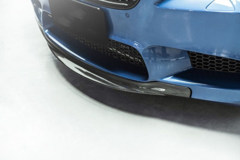 BMW F10 M5 Carbon Fibre RKP Style Car Front Spoiler Lip - Provides an aggressive yet elegant addition to the M5 front end by filling in the gap, which increases aerodynamics while making your M5 look more aggressive. Manufactured from 2*2 3K Twill Carbon Fibre and FRP to give the best fitment possible with minimal fitting work required. Our parts are moulded from 3D Scans of original parts to give our products the best fitment possible. 