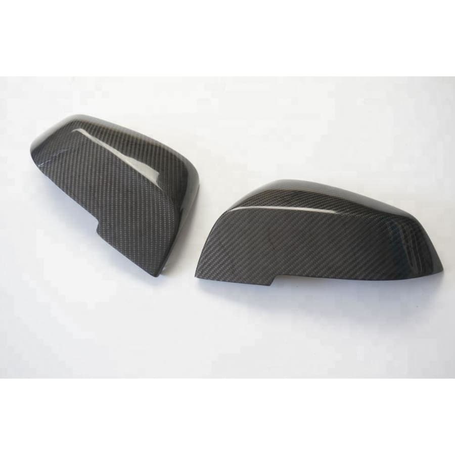  BMW OEM Style Full Replacement Carbon Fibre Mirror Covers - For those looking to add carbon on a more subtle level or if you're looking to keep with the OEM look with a touch of aftermarket styling, this product is perfect. For the 1/2/3/4 Series and Pre-Facelift M2 Models, these mirror covers are a simple replacement for your existing mirror covers and offer the same OEM Fitment. 