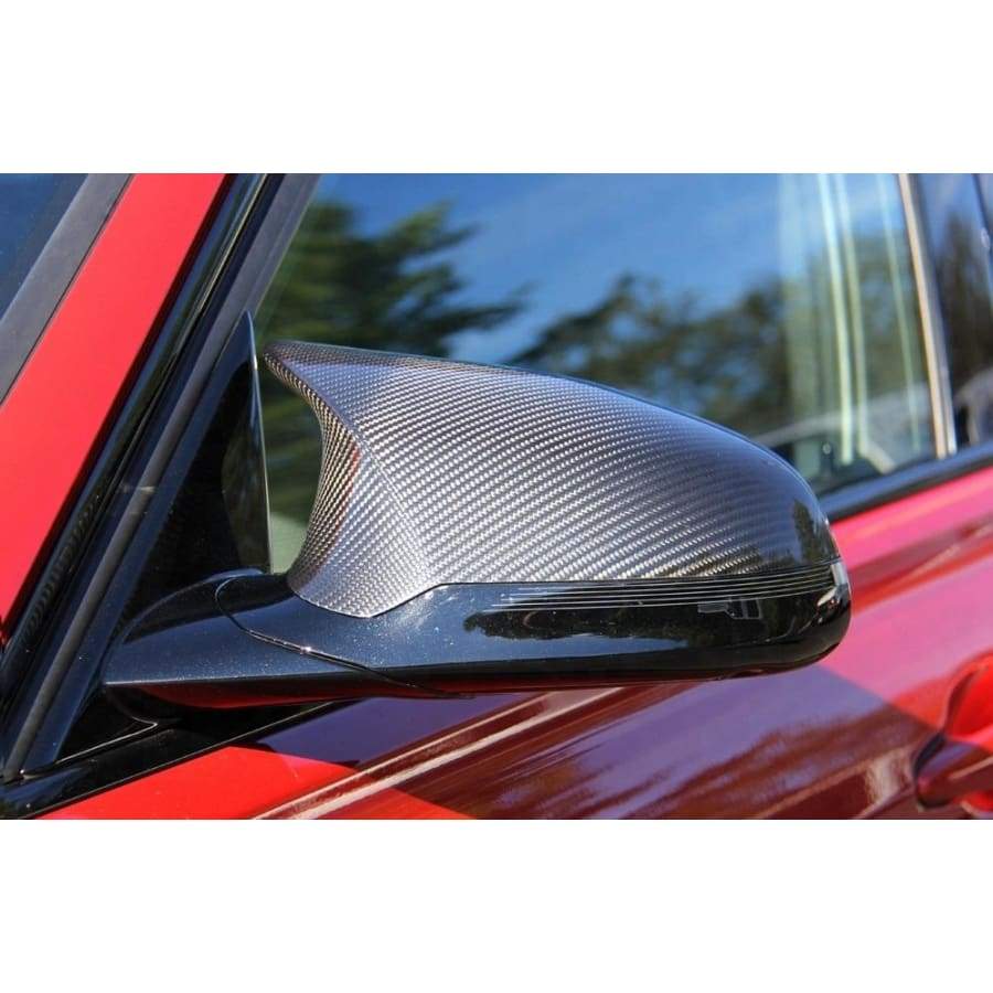BMW F8X M2/M3/M4 Mirror Cover Set is Instantly and dramatically improves the sporty appearance of your car. This rearview mirror cap offers your car a more aggressive racing look and shows your characteristic when driving.  The Carbon Fibre Mirror Cover Set is made of 2*2 3K Twill Carbon Fibre and plastic Material which is Super light Weight and Durable. This mirror is a UV-Protective Clear Coated, Fade & Rust Resistant. It is a Great fitment & easy installation with no modification or Cutting.