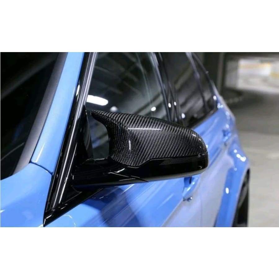 BMW F8X M2/M3/M4 Mirror Cover Set is Instantly and dramatically improves the sporty appearance of your car. This rearview mirror cap offers your car a more aggressive racing look and shows your characteristic when driving.  The Carbon Fibre Mirror Cover Set is made of 2*2 3K Twill Carbon Fibre and plastic Material which is Super light Weight and Durable. This mirror is a UV-Protective Clear Coated, Fade & Rust Resistant. It is a Great fitment & easy installation with no modification or Cutting.