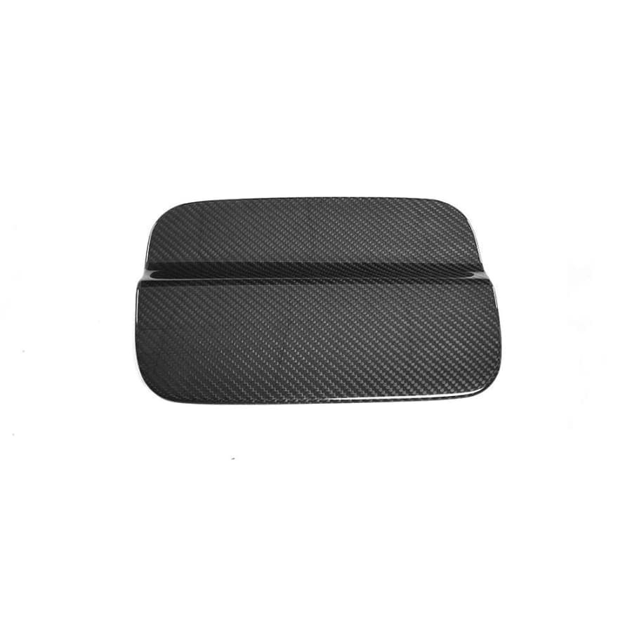 BMW M4 F82/F83 Carbon Fibre Fuel Cap Cover - Designed to give the side view of your BMW M4 that touch of carbon by transforming your colour coded fuel flap into a Carbon Fibre fuel flap cover. This product is manufactured from 2*2 Carbon fibre Weave and is designed as an add on part that does not require the removal of any parts to fit. 