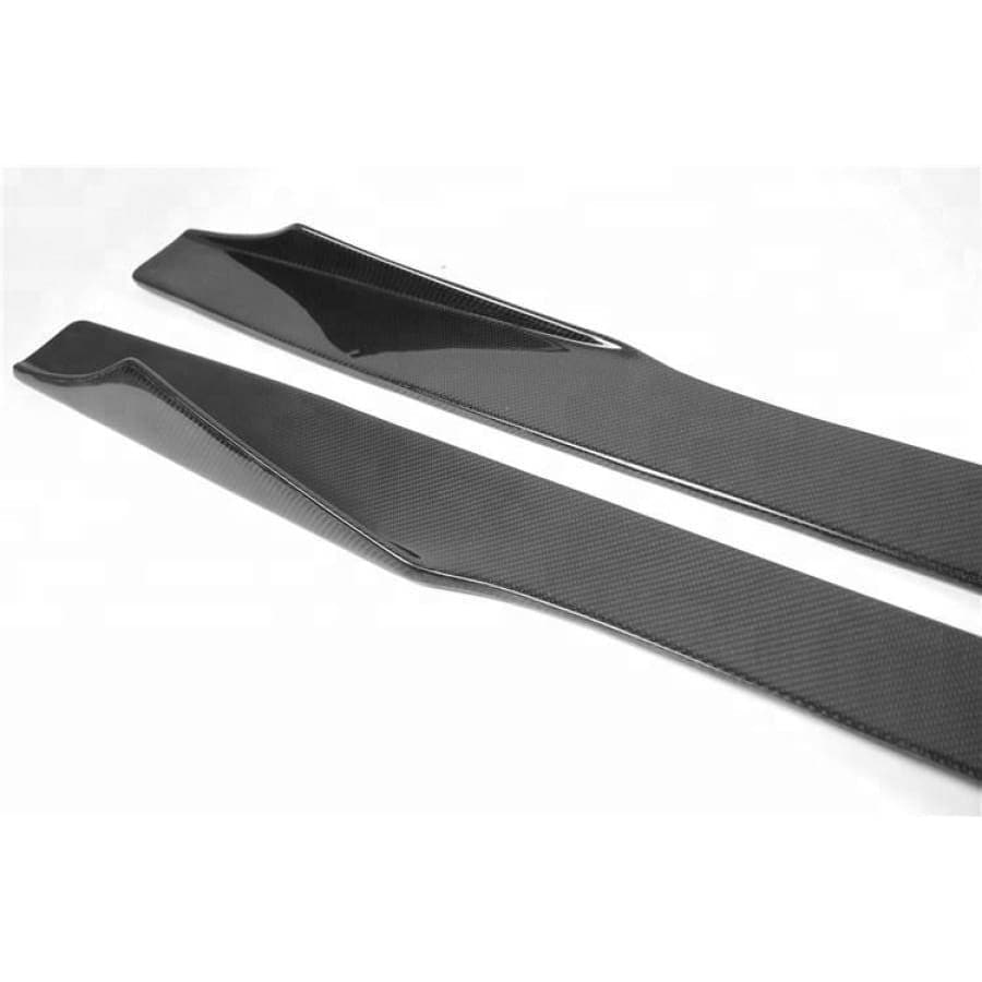 BMW M2/M2C MTC Style Carbon Fibre Full Length Side Skirt Extensions - Manufactured with Real Carbon Fibre and FRP to produce a strong and durable product that will not only stand the test of time but with MTC's Styling you can be sure your M2 will stand apart from the other M2 models with the M Performance parts. The design of this product enhances the BMW M2's side angle by providing full coverage from the rear wheels to the front wheels with the uptake swoosh on the rear. 