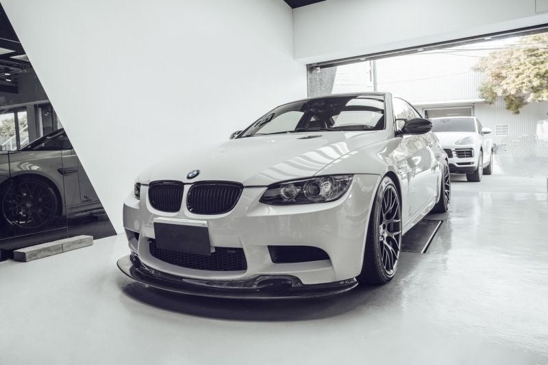 BMW M3 GT4 Style Carbon Fibre Front Lip Spoiler for the E90 Saloon, E92 Coupe and E93 Convertible Models - Manufactured from 2*2 Carbon Fibre weave and designed in the GT4 Styling for the BMW M3 Models, this product enhances the front aerodynamics while also adding more aggression to this already aggressive model. 