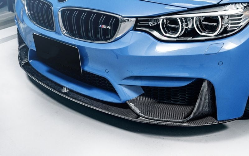 BMW M3/M4 (F80/F82/F83) M Performance Inspired Carbon Fibre Front Lip Spoiler - Manufactured from 2*2 Carbon Fibre in the original M Performance Styling to produce a simplistic and elegant touch to the front of your M3 or M4 BMW. This product was designed to look fantastic while also offering the performance downforce upgrade that comes with this front lip spoiler. 