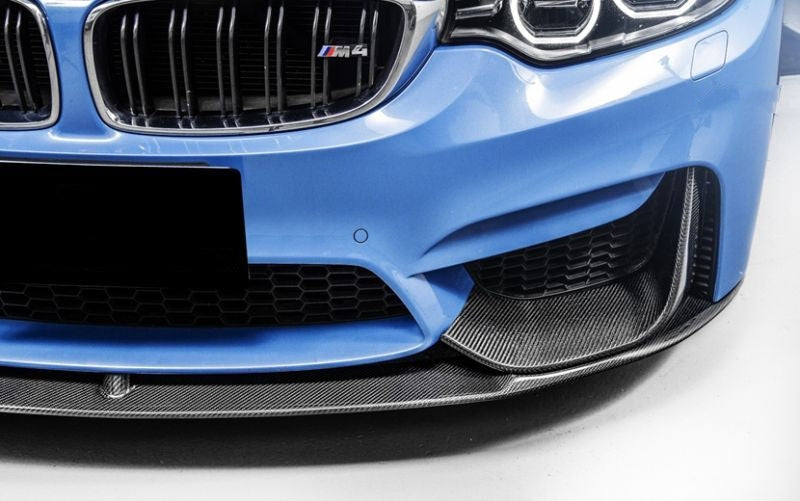 BMW M3/M4 (F80/F82/F83) M Performance Inspired Carbon Fibre Front Lip Spoiler - Manufactured from 2*2 Carbon Fibre in the original M Performance Styling to produce a simplistic and elegant touch to the front of your M3 or M4 BMW. This product was designed to look fantastic while also offering the performance downforce upgrade that comes with this front lip spoiler. 