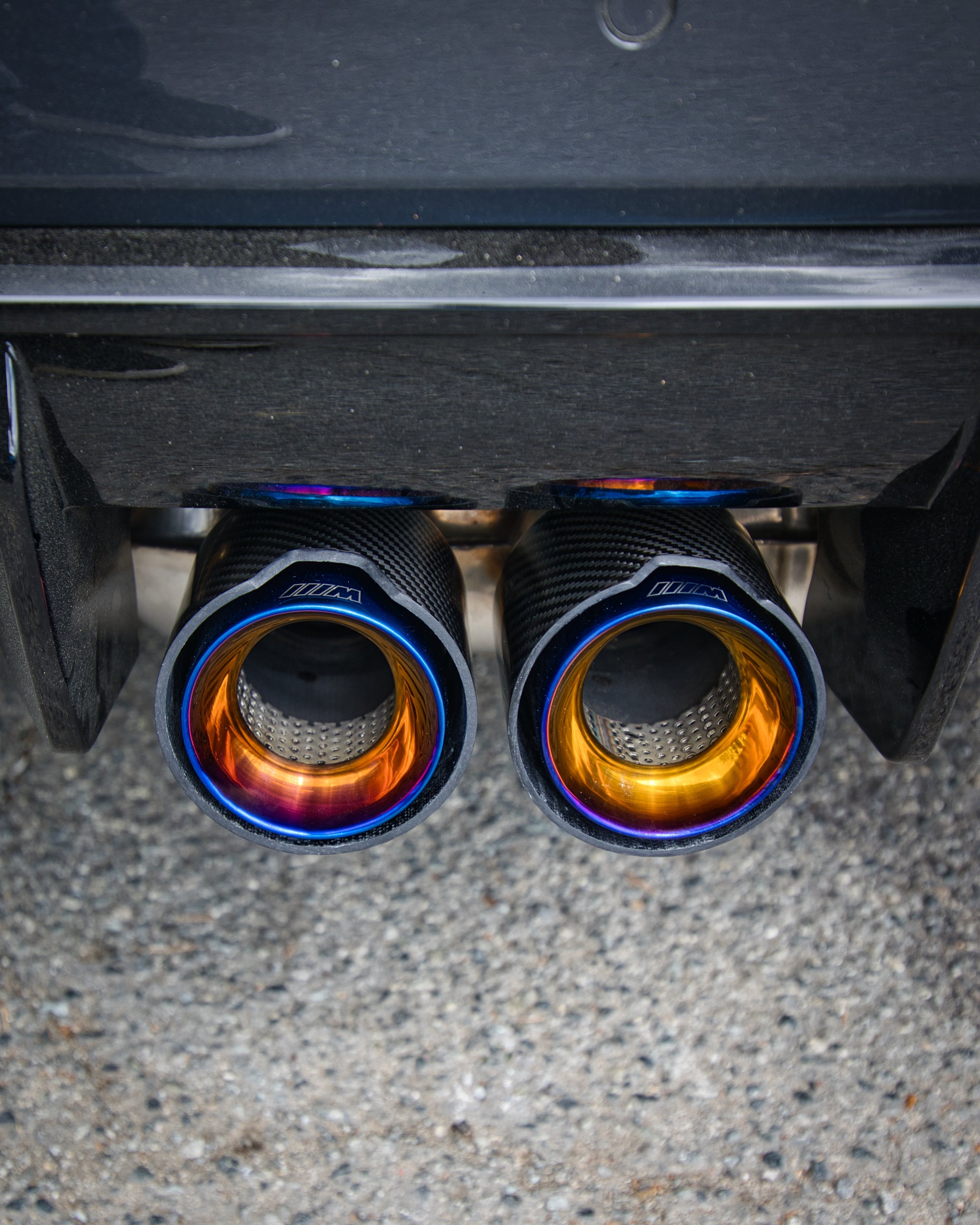 BMW M3/M4 G80/G82/G83 OEM M Performance Style Carbon Fibre Exhaust Tips - Manufactured from 2*2 Carbon Fibre Weave with 304 Stainless Steel. This product is coated in your choice of finishings to produce a stunning exhaust modification that is entirely reversible. With the large 105MM outlet, this product adds a more aggressive look to the rear end of your M3/M4 BMW. 
