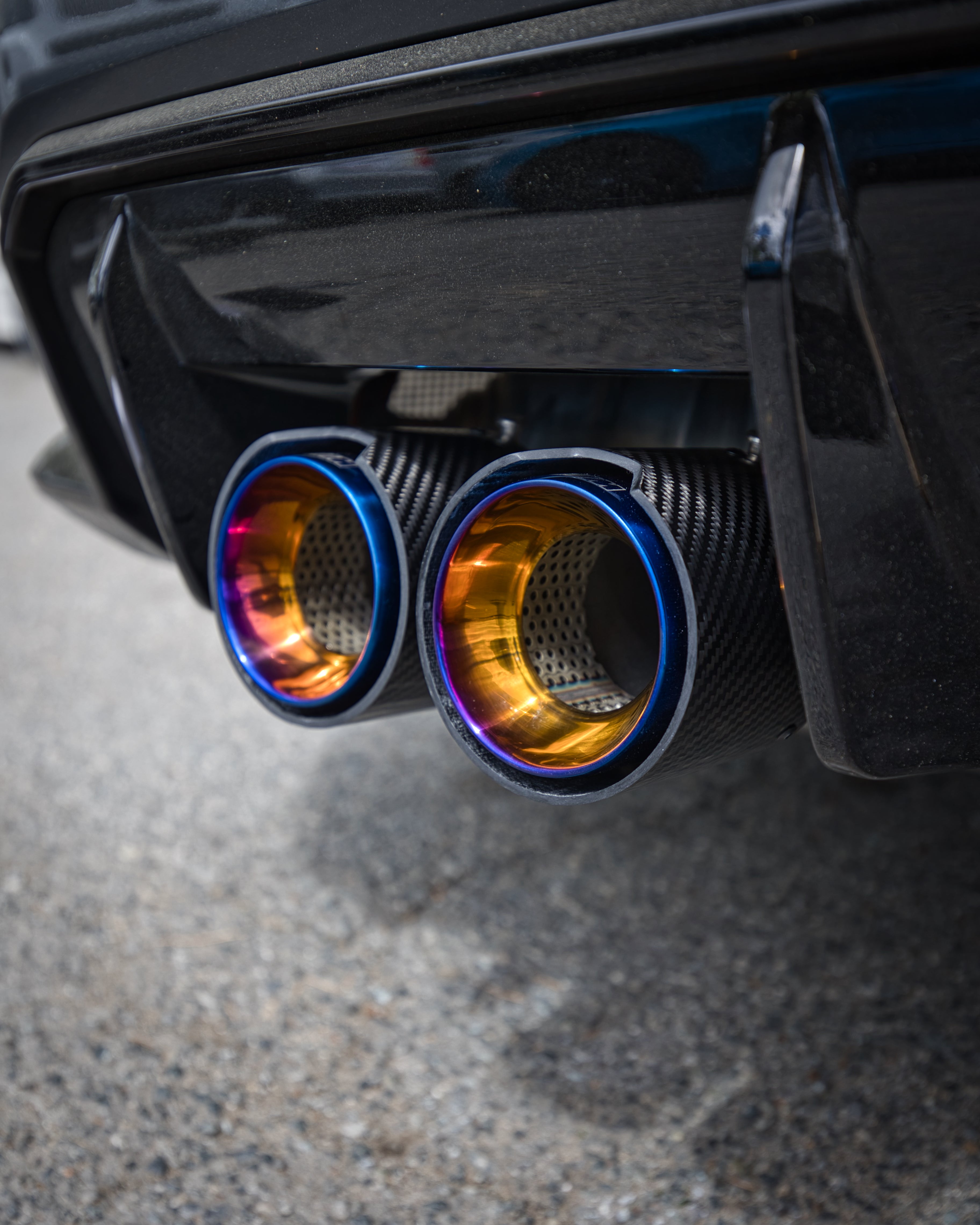 BMW M3/M4 G80/G82/G83 OEM M Performance Style Carbon Fibre Exhaust Tips - Manufactured from 2*2 Carbon Fibre Weave with 304 Stainless Steel. This product is coated in your choice of finishings to produce a stunning exhaust modification that is entirely reversible. With the large 105MM outlet, this product adds a more aggressive look to the rear end of your M3/M4 BMW. 
