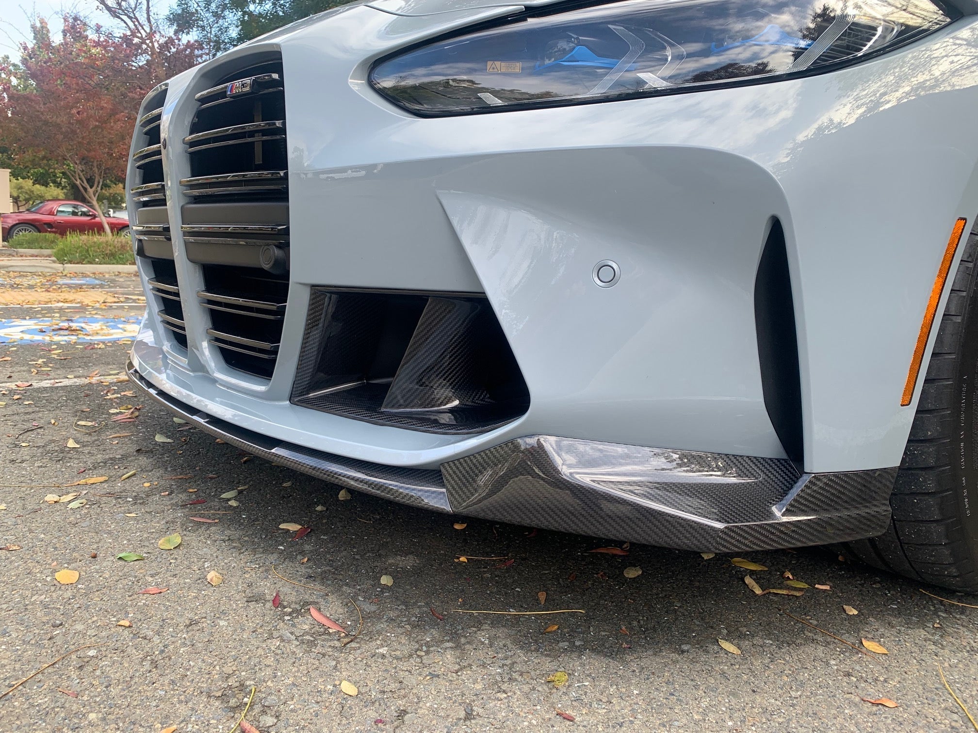 BMW G80/G82 M3/M4 M Performance Style Carbon Fibre Front Lip Spoiler - Manufactured from 100% Carbon Fibre to be a perfect fit for the G80/G82 M3/M4 Models. Taking inspiration from the masters of performance parts BMW with this M Performance front lip spoiler, you will be able to add a unique touch to your new BMW G80/G82 M3/M4. 