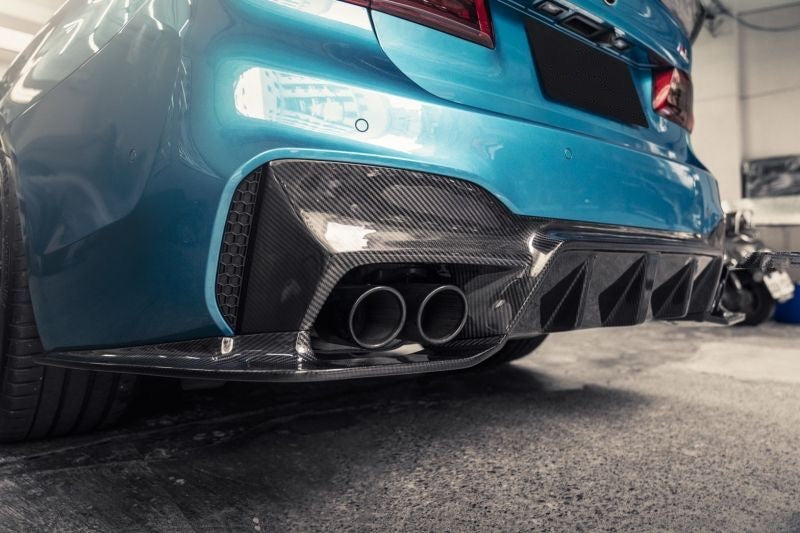 BMW F90 M5 3D Design Japan Style Carbon Fibre Rear Diffuser With Canards - Manufactured from 2*2 Carbon Fibre Weave in the 3D Design Japan Styling for the F90 and F90N BMW M5 Models. This product is truly the most aggressive rear diffuser available for the F90 M5 Models with the Lower Rear Canards, which give this diffuser a full wrap-around feature, replacing the entire lower rear bumper section with stunning carbon fibre.