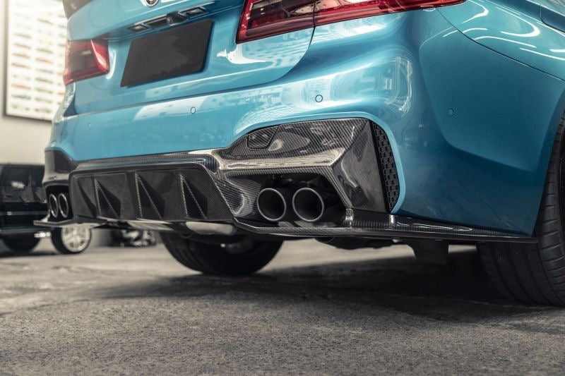 BMW F90 M5 3D Design Japan Style Carbon Fibre Rear Diffuser With Canards - Manufactured from 2*2 Carbon Fibre Weave in the 3D Design Japan Styling for the F90 and F90N BMW M5 Models. This product is truly the most aggressive rear diffuser available for the F90 M5 Models with the Lower Rear Canards, which give this diffuser a full wrap-around feature, replacing the entire lower rear bumper section with stunning carbon fibre.