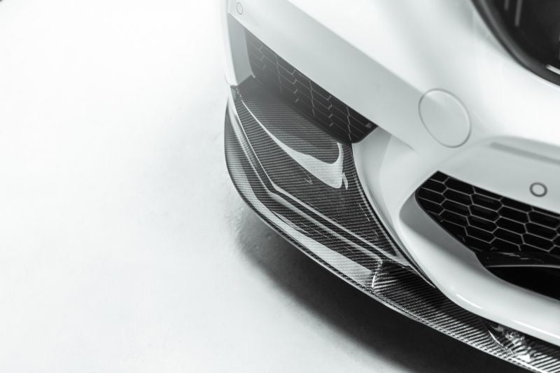 Add a touch of carbon fibre elegance and improve the performance of your BMW M5 with this M Performance style front lip spoiler. Made from CFRP and designed to fit the 2018-2020 pre-facelift F90 M5 models, this spoiler enhances the front end of your car and improves its downforce and stability at high speeds. Order now and give your M5 the M Performance look and feel it deserves.
