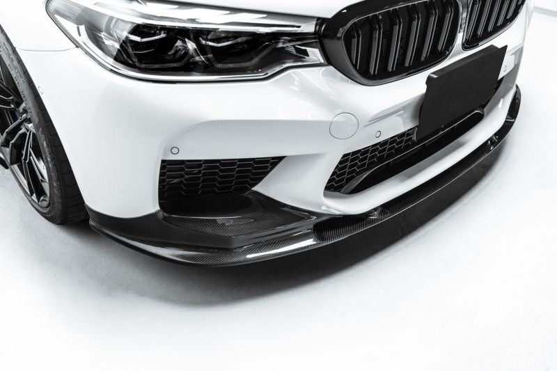 Add a touch of carbon fibre elegance and improve the performance of your BMW M5 with this M Performance style front lip spoiler. Made from CFRP and designed to fit the 2018-2020 pre-facelift F90 M5 models, this spoiler enhances the front end of your car and improves its downforce and stability at high speeds. Order now and give your M5 the M Performance look and feel it deserves.