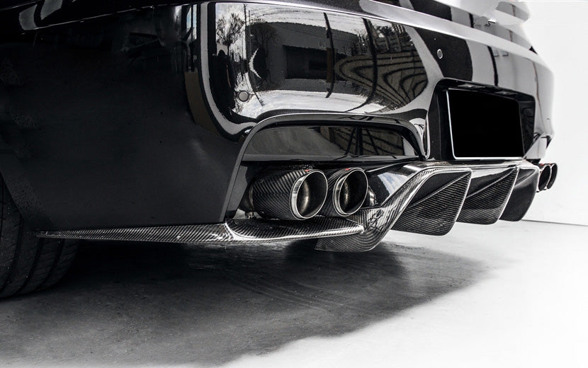 BMW M6 V Style Carbon Fibre Rear Bumper Diffuser for the F06/F12/F13 M6 Models - Inspired by the Vorstiener styling to create a functional and stunning diffuser that sits along the bottom of the original bumper and has large fins to create a better diffusion of the air circulating out from under your M6 as you drive. Manufactured from Carbon fibre and FRP to create a strong and durable product that will last the lifetime of your M6 when looked after. 