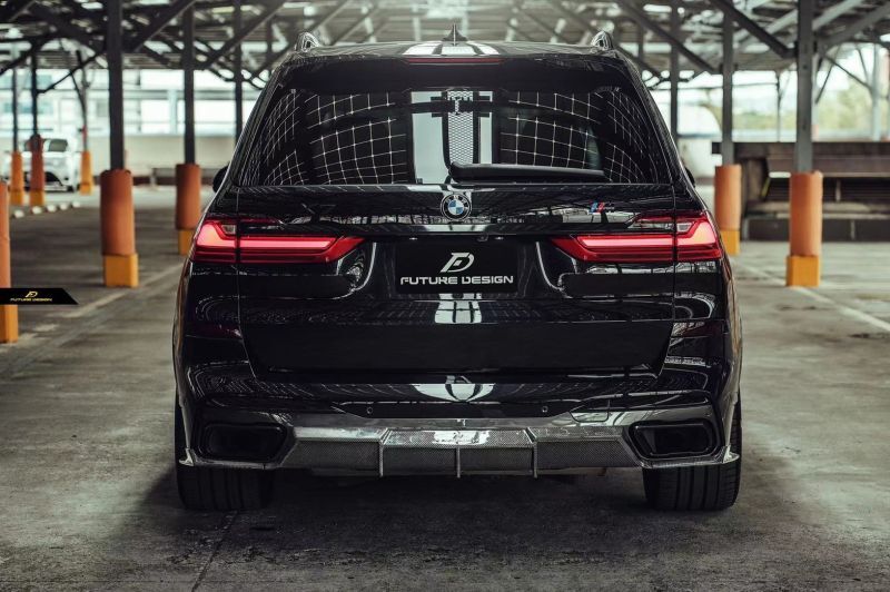 BMW X7 (G07) Future Design Carbon Fibre Rear Diffuser - Manufactured from Real Carbon Fibre with a unique design 3-Piece Complete Diffuser with rear bumper canards that sit perfectly under the exhaust tips on the X7 Model. This diffuser dramatically changes the dynamics of the rear-end view and shows just how aggressive this stunning car can be while maintaining luxury. 