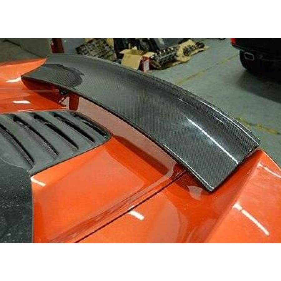 Mclaren MP4 Coupe/Convertible Carbon Fibre Rear Wing Spoiler. The 12C Spoiler for the Coupe and Convertible Models has been designed using 3D Imaging to ensure we achieve the perfect fitment for your Mclaren 12C. Each part is manufactured and finished by hand to produce a stunning piece to add to any Mclaren. Giving you a unique opportunity to make your Mclaren stand apart.