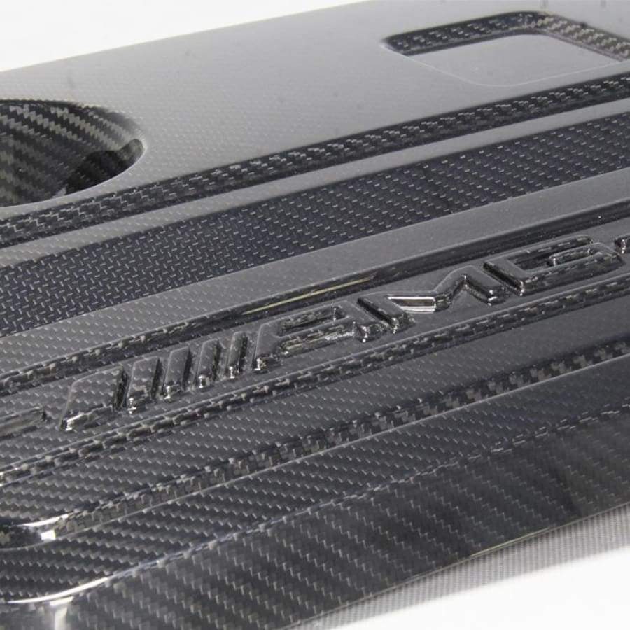 Mercedes Benz AMG A45/CLA45/GLA45 Carbon Fibre Engine cover Replacement for the M133 Engines Between 2013 - 2018 - This replacement engine cover is manufactured from 2*2 Carbon fibre weave with FRP to be able to withstand the high temperatures that the M133 2.0L Engine can get to when running and manufactured to fit both the 265Kw and 280Kw Engine variants. This product is a simple addition to any 45's engine bay. 