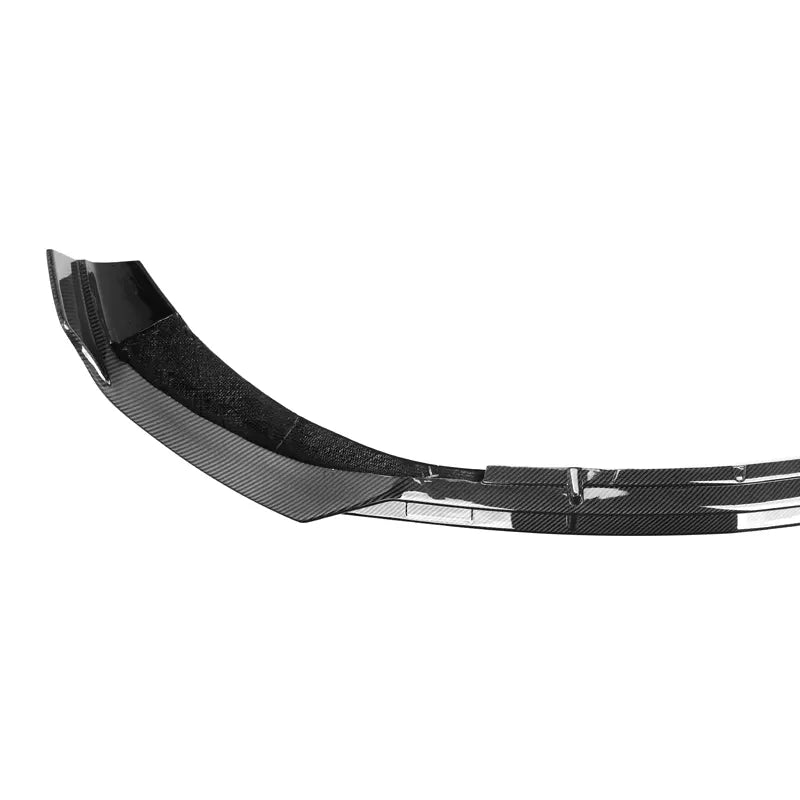 Enhance the sporty and aggressive look of your 2022+ Mercedes Benz W206 C-Class with this 3 Piece front lip spoiler from BRABUS. Precision crafted from high-quality carbon fibre, this front lip spoiler is designed to fit the saloon models only and will add a sleek and aerodynamic touch to the front of your car. The BRABUS style design adds a touch of luxury and performance, setting your C-Class apart from the rest.