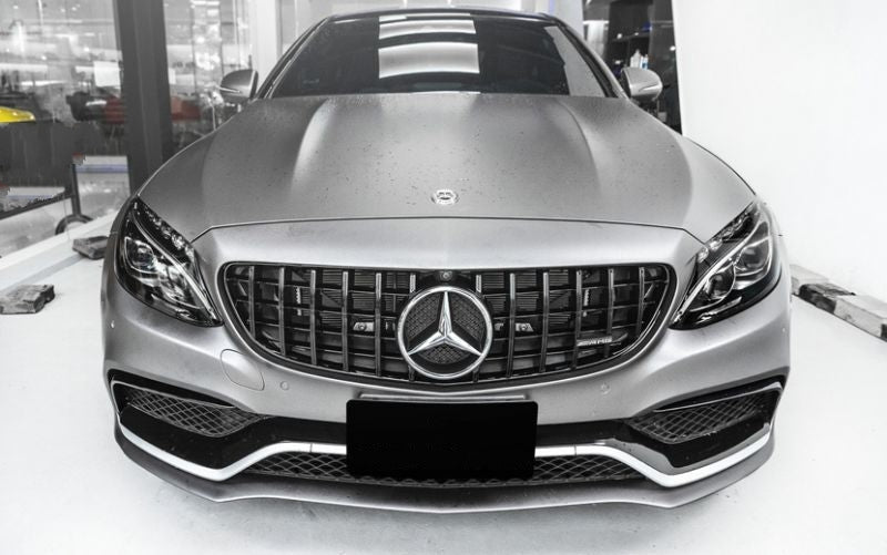 Mercedes C-Class A205/C205/W205 C63 AMG GT Style Panamerica Gloss Black Front Grille - Manufactured to redesign the front end of your C63 With its vertical slats providing better airflow to the radiator to keep that 4.0L Twin Turbo V8 cooler for performance and longevity gains. This product is exquisitely designed with ABS Plastic to be durable as well as aesthetically pleasing. Take your C63 to the next level with this stunning grille. 