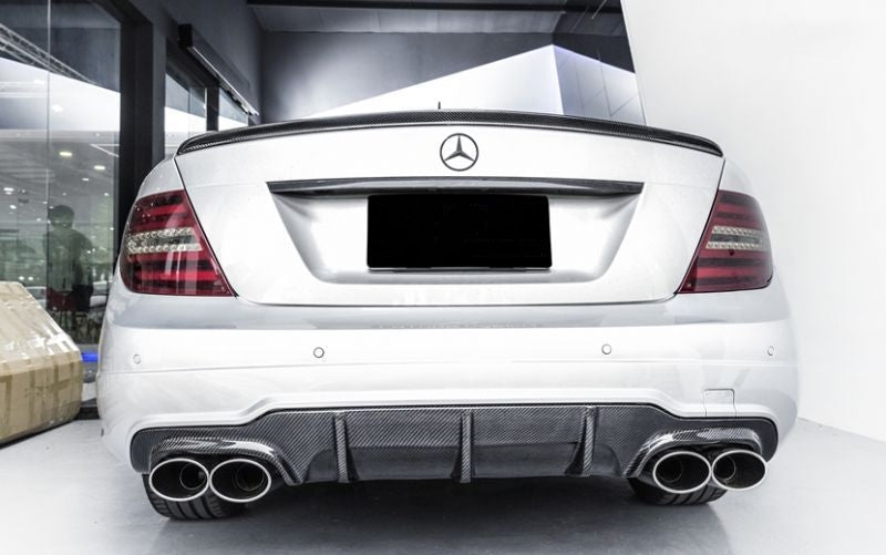 Mercedes Benz C63 (C204/W204) Facelift 12-14 Carbon Fibre Rear Diffuser - The design was taken directly from the OEM product and improved with carbon fibre. This product is the perfect way to subtly add to your C63 with its ability to add texture and sophistication to an absolute animal of a car. With its 2*2 Carbon Fibre structure a UV Resistant resin finish, you can be sure this part will be perfect for your C63.