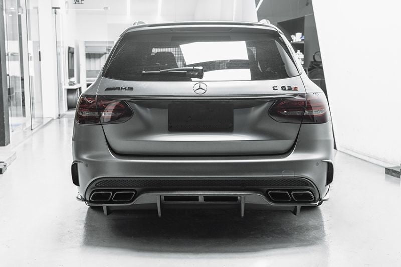 Mercedes Benz C63 Saloon (W205) and Estate (S205) PSM Style Carbon Fibre Rear Diffuser Under Tray - Inspired by the PSM Styling for the C63 Models, This product is the ultimate addition to the C63's Rear end with a full undertray feature that encapsulates the exhaust tips in between either stock diffuser and the PSM Undertray diffuser. This product truly makes your C63 Model Unique.
