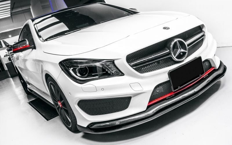 Mercedes Benz Pre-Facelift CLA-Class and CLA45 REVO Design Style Carbon Fibre Front Lip Spoiler - Manufactured from 2*2 Carbon Fibre weave with FRP to produce a stunning design that enhances the front bumper on your CLA-Class AMG Line or CLA45 Sportback Model. For the Pre-Facelift Models Only