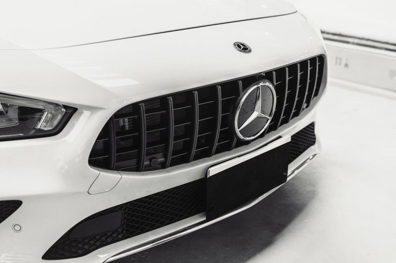 Mercedes Benz CLA Class/CLA45 (W118) GT Style Panamerica Grille Kit is a must-have on the new CLA Class Model. This item comes in a glossy black finish for an eye-catching look. It is effortless to install for beginners. It is Reinforced plastic for strength and extra durability. Designed to give your model the CLA Class Model that AMG Look with this Panamericana style front grill. It's made from High-Quality Gloss Black ABS Plastic. It enhances the exterior styling of your car.