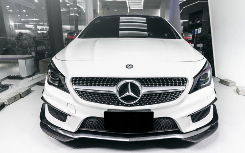Mercedes Benz CLA-Class (W117/C117) Pre-Facelift AMG Style Carbon Fibre 6 Piece Canard Set - Manufactured from 100% 2*2 Carbon Fibre Weave. This Front Canard Set is installed with either 3M double-sided tape or bonding glue and is the perfect way to accent the CLA-Class front bumper with subtle touches of carbon fibre. 