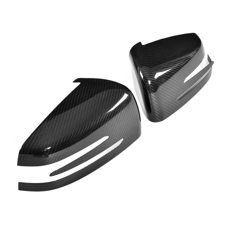 Mercedes Stick On Carbon Fibre Mirror covers - Designed from the original part to be a perfect addition to your original mirror covers. This product fits seamlessly over the top of your existing mirror covers with supplied 3M Double-sided tape. This product is the perfect easy Carbon Modification that's completely reversible. W212 E-Class & E63 Saloon W212 E-Class & E63 Estate W204 C-Class & C63 A207/C207 E-Class & E43 W218 CLS-Class & CLS63 C117 CLA-Class & CLA45 W221 S-Class W216 CL-Class