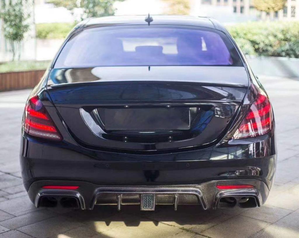 Mercedes Benz S-Class/S63/S65 (W222) Facelift BRABUS Style Carbon Fibre Rear Bumper Diffuser with LED Lights and BRABUS Exhaust Tips - Manufactured from 2*2 Carbon Fibre the BRABUS Style Diffuser enhances the full rear end of the S-Class Mercedes and adds a layer of aggression to this prestigious model, accompanied by the BRABUS Style Metal Exhaust tips this product completely overhauls the rear end of the Mercedes S-Class. 