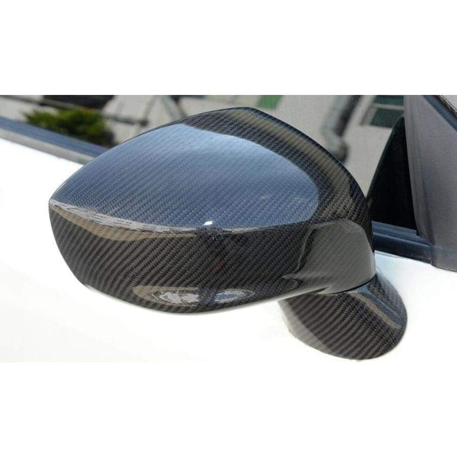  Nissan GTR R35 Pre-Facelift Carbon Fibre Replacement Mirror Covers - Manufactured from 2*2 Carbon Fibre Weave and ABS Plastic, these full replacement mirror covers come with the replacement housing and lower mirror cover sections. Adding these mirror covers to the GTR Enhances the overall look of the side view by adding value to this stunning car with Real Carbon Mirror Covers.