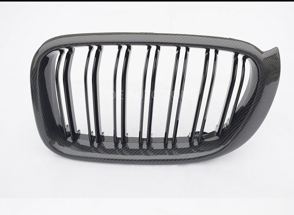 BMW X3/X4 (F23/F24) M Style Carbon Fibre Front Grilles - Manufactured from ABS Plastic coated in Gloss Black Paint with Real Carbon Fibre Surrounds. This product enables more efficient cooling with its twin slat design while also reducing weight and increasing aerodynamics.