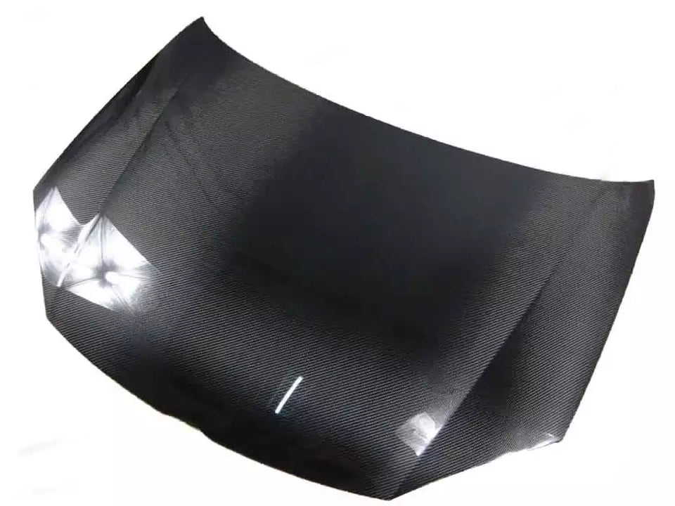 Enhance the style and performance of your Volkswagen Golf Mk5 with a high-quality carbon fibre hood. Designed to fit the Golf Mk5 SE, GTI, GTD, and R32 models, this hood improves aerodynamics and adds a sleek, sporty look to your car. UV-resistant gloss resin coating and corrosion-resistant construction ensure long-lasting durability. Upgrade your Golf Mk5 with a premium carbon fibre hood today.